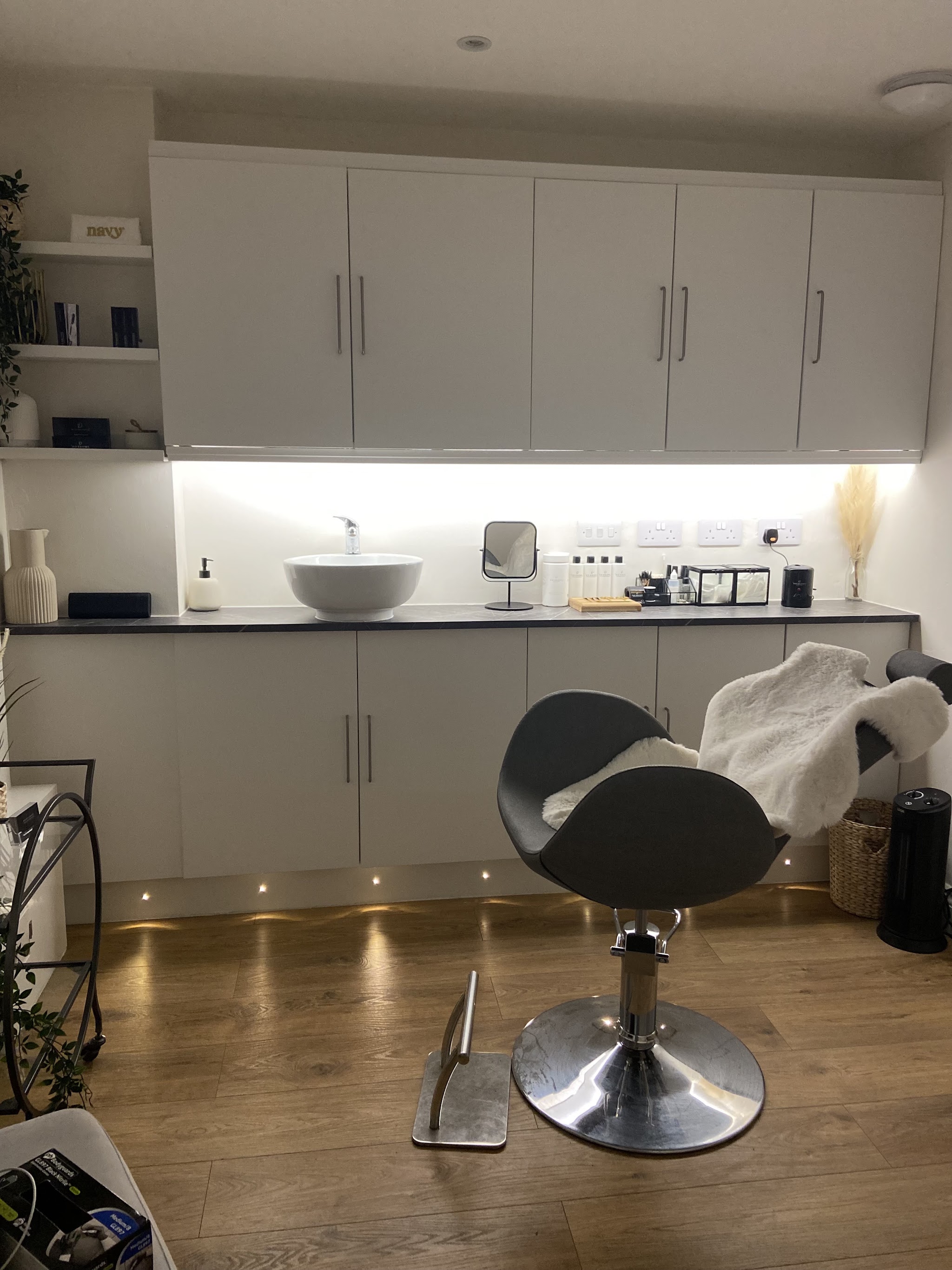 Treatment room with LED strip under the cabinets and floor lights