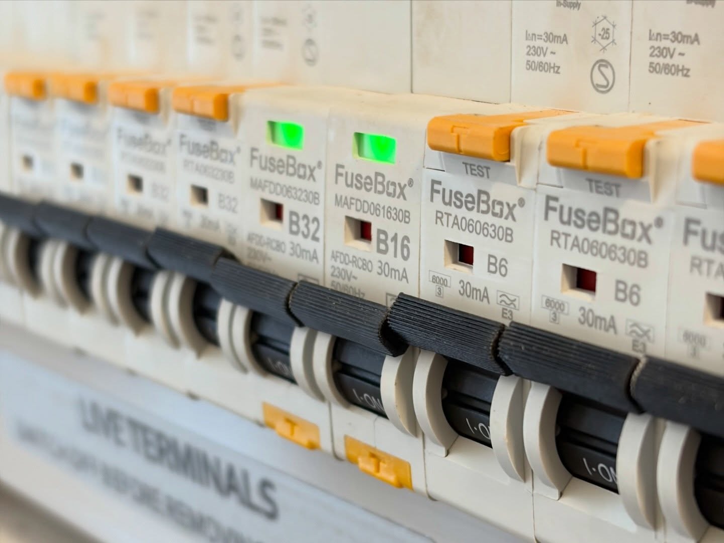 Close-up of FuseBox RCBOs with arc fault detection on an HMO-ready board